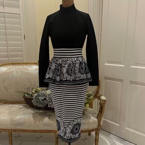 Black/white peplum knit midi dress,NWOT
Size M